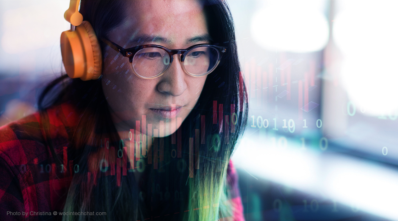 Female researcher with orange headphones