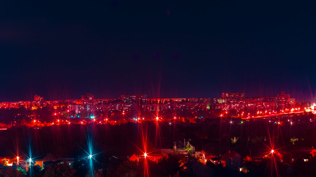 a harbor at night with red lights to emphasize the need for red team testing to achieve fedramp authorization